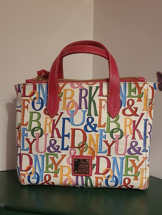 Dooney & Bourke Handbags - Vintage & Retired Dooney & Bourke Retro Grafica Ruby Mini Sachel.